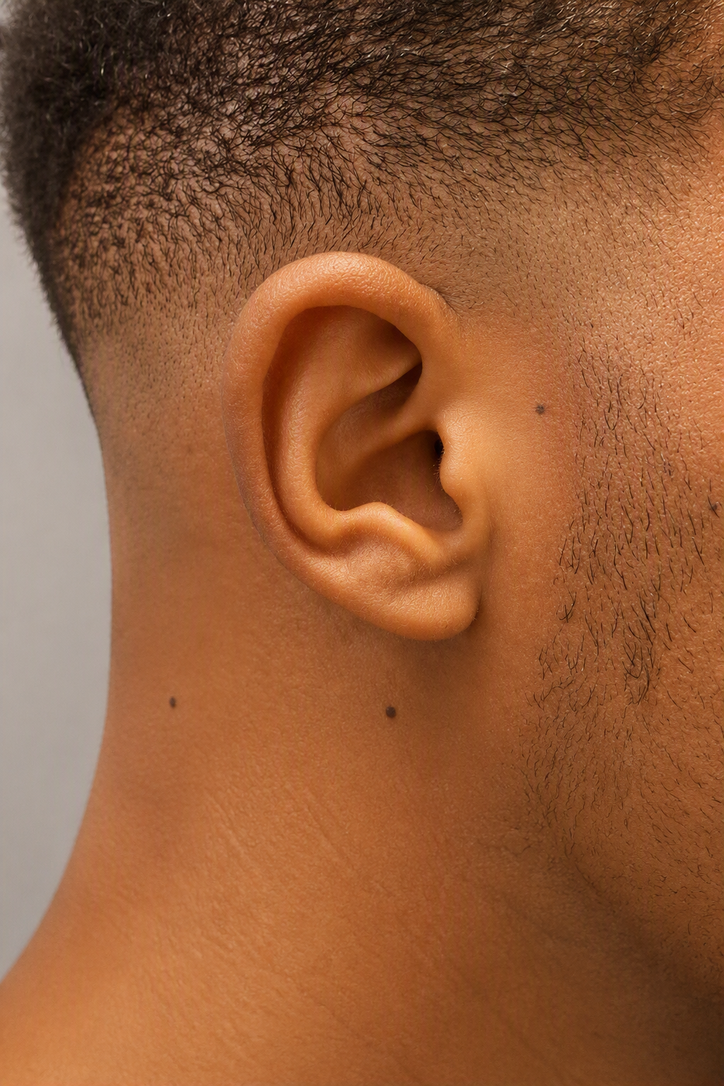 Close-up of an ear for auricular reflexology